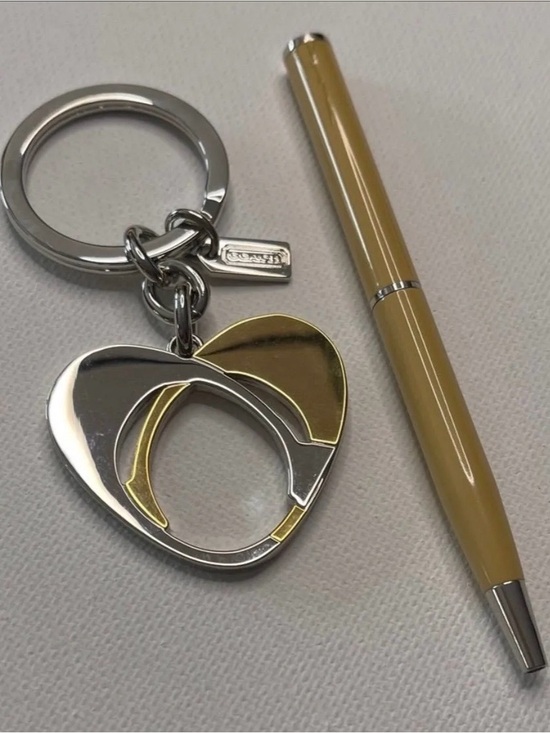 Coach Accessories - Coach Silver and Gold Heart
Keychain with Cream Coach Pen NWOT